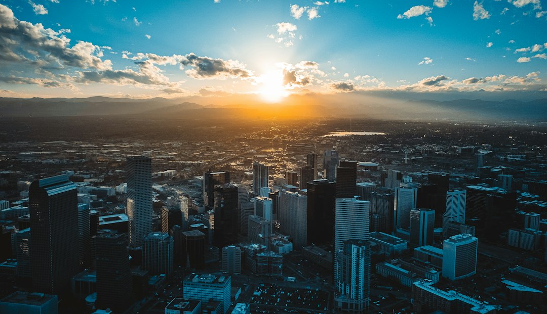 Denver skyline at dusk with city lights