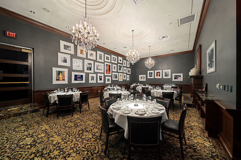 Crystal chandeliers and elegantly set dining tables at III Forks Austin